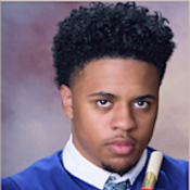 A headshot of 2024 scholarship winner Floyd Cobb is displayed.